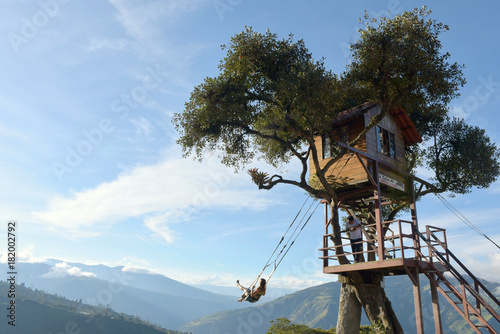 The Swing At The End Of The World Located At Casa Del Arbol, The Tree House In Banos De Aqua Santa, Ecuador, South America photo