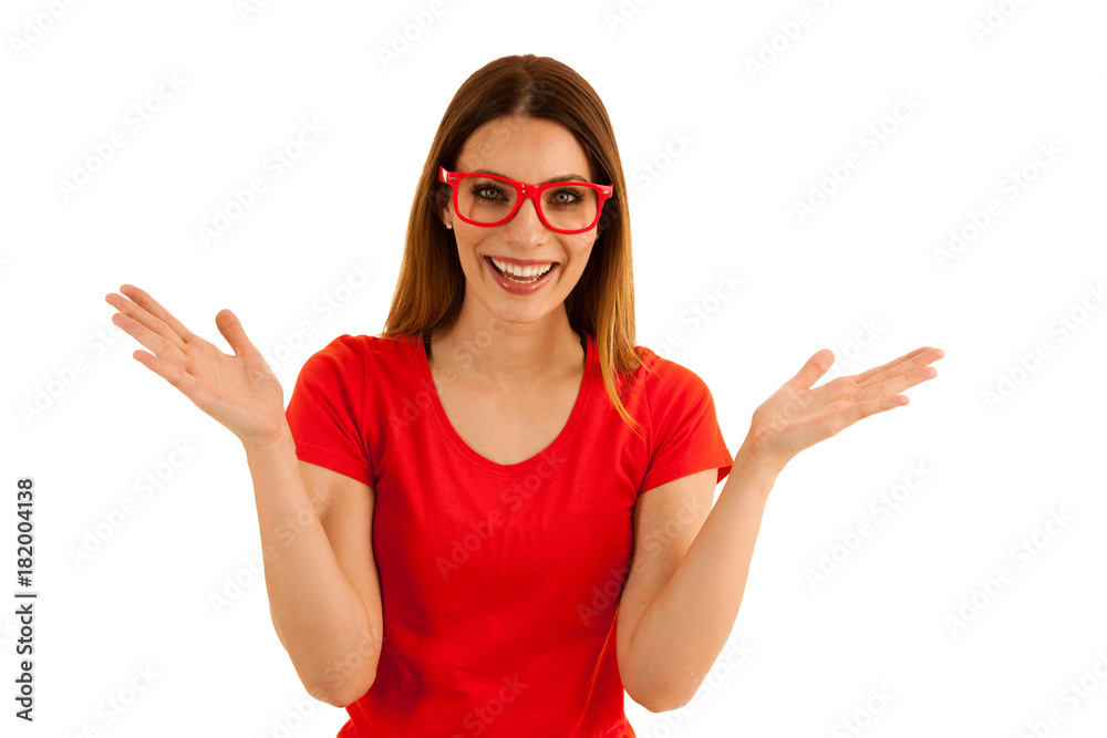 Beautiful young woman in red t shirt pointz in copy space isolated over white background Beautiful young woman in red t shirt pointz in copy space isolated over white background