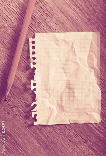 clean crumpled sheet with pencil