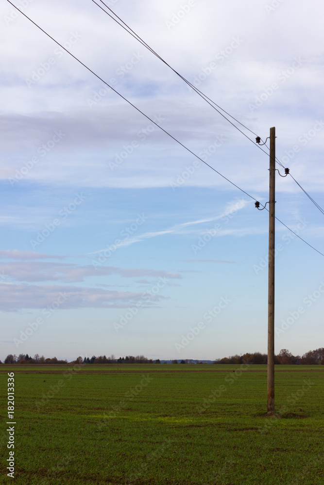 telegraph pole in autumn landscape