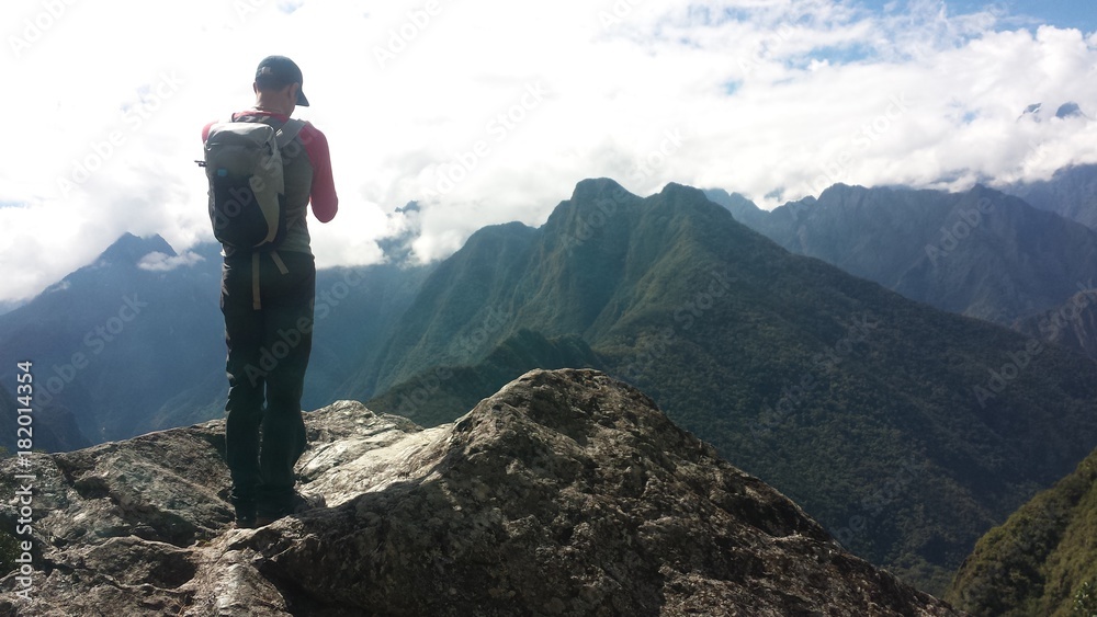 Man Hiker Standing on Mountain Top Overlook