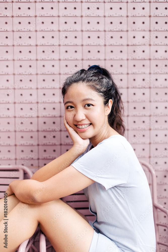 Happy Asian young woman smiling Happy Asian young woman smiling