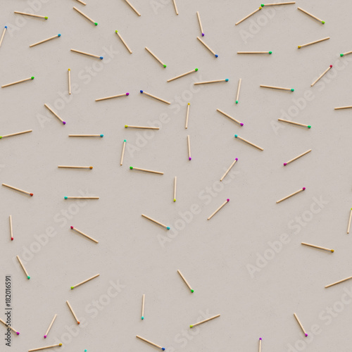 Isometric perspective on scattered vibrantly colored matchsticks © stockmorrison