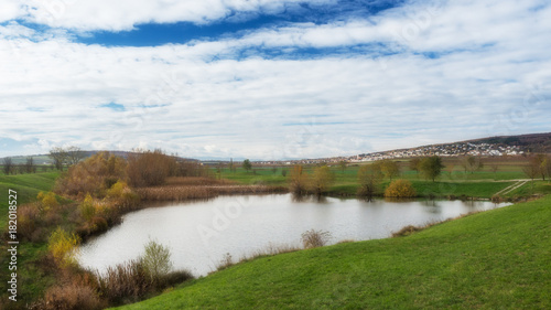 Großhöflein im Burgenland mit Teich im Vordergrund