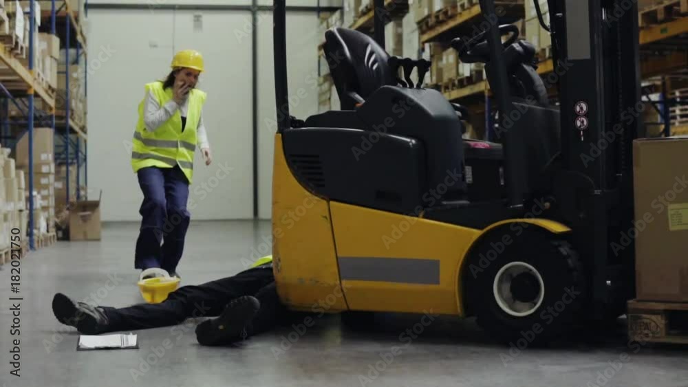 An injured worker after an accident in a warehouse.