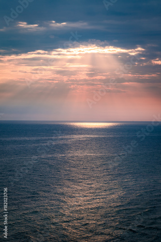 Dynamic and calm dusk over ocean in summer