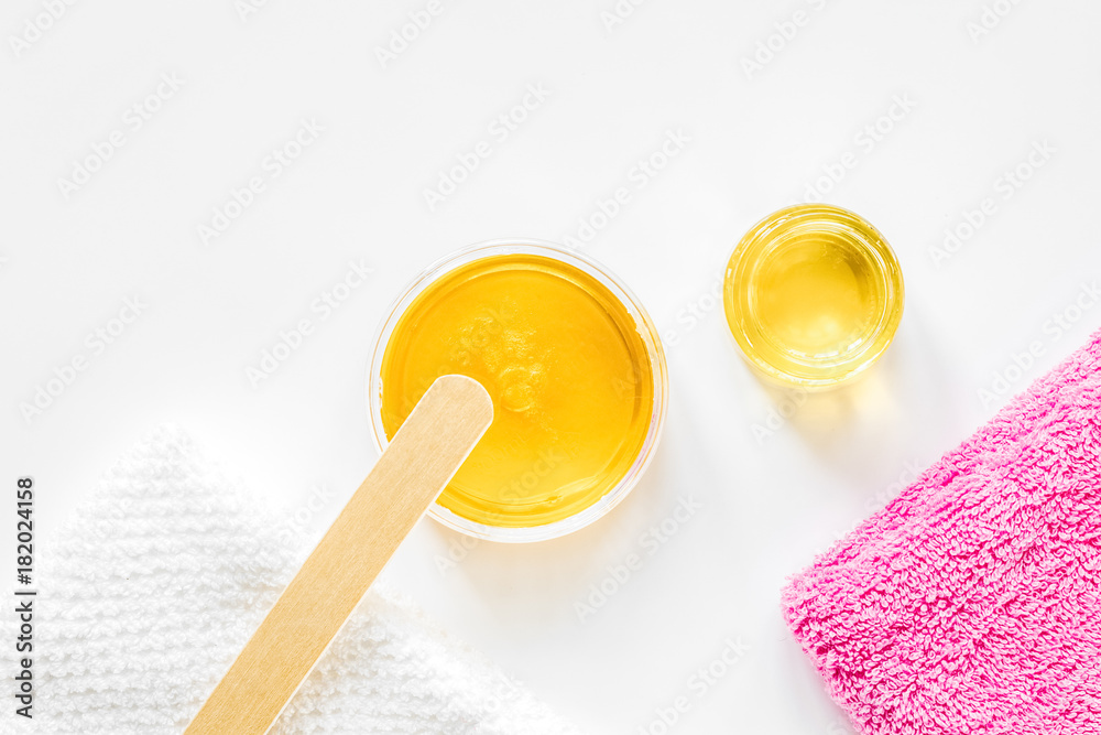 concept depilation with wax on white background top view concept depilation with wax on white background top view