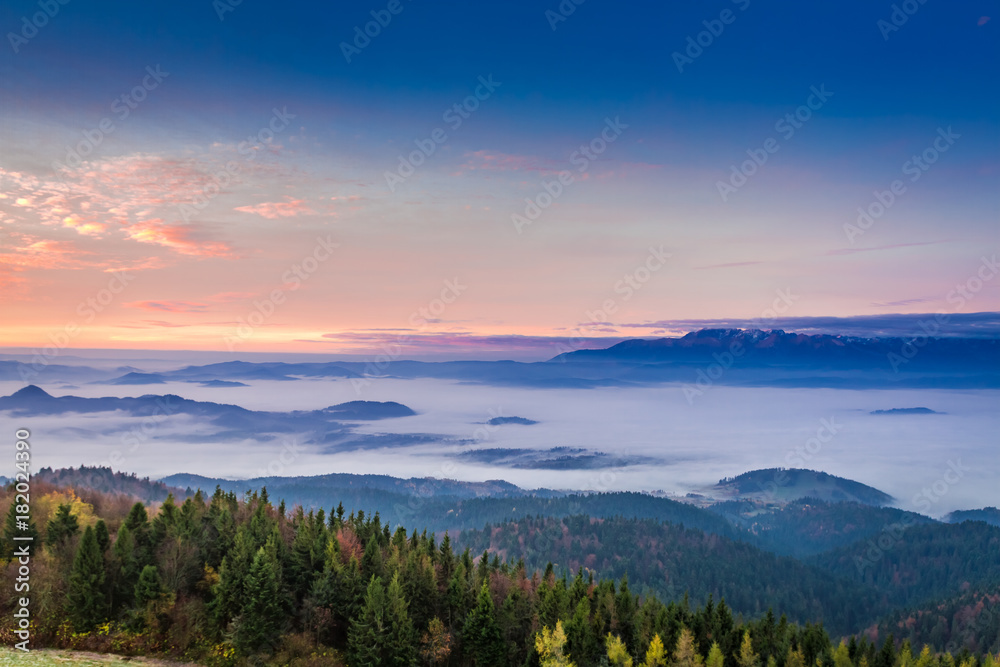 Stunning view to Tatras at sunrise with clouds in autumn