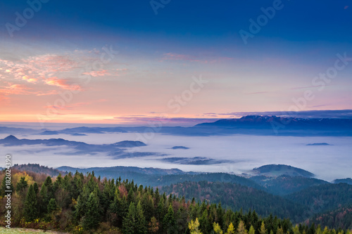 Stunning view to Tatras at sunrise with clouds in autumn