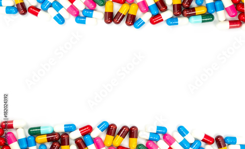 Colorful of antibiotic capsules pills isolated on white background with copy space. Drug resistance concept. Antibiotics drug use with reasonable and global healthcare concept. photo