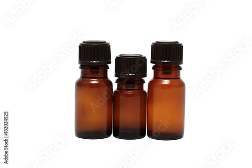 three bottles of aromatherapy oils isolated close-up
