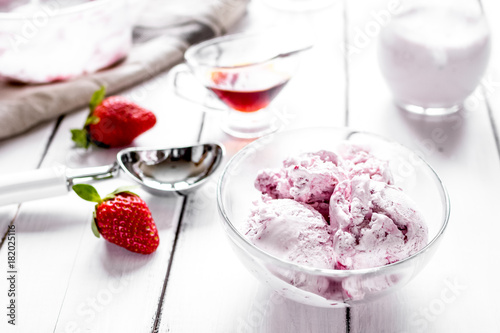 organic homemade ice cream in glass bowl on wooden background