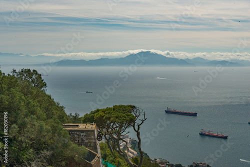 View from the Rock of Gibraltar across the Strait of Gibraltar to Morocco's Atlas Mountains photo