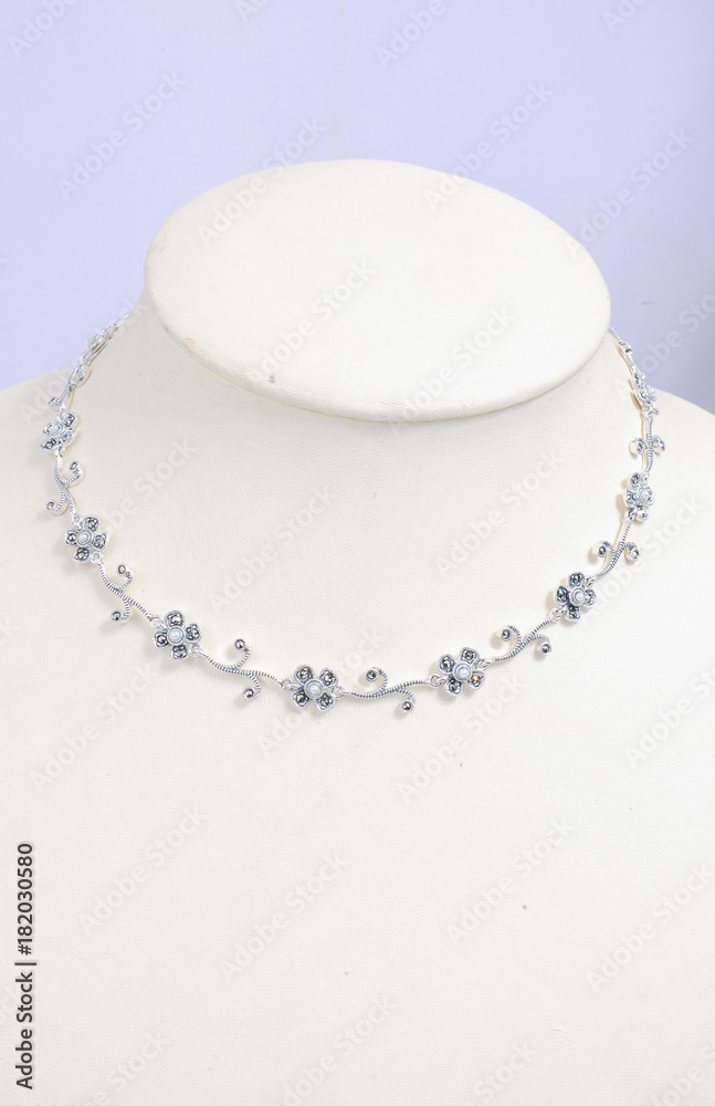 diamond and peark necklace on display diamond and peark necklace on display