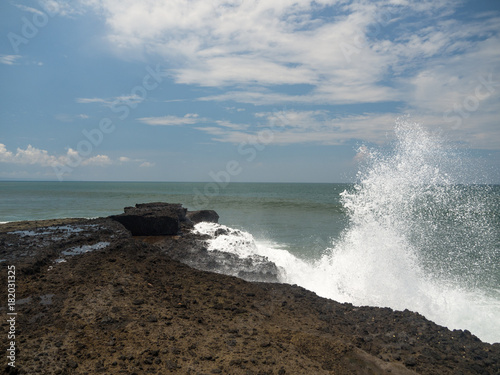 Rocks and waves on beach-Bali,Indonesia. November, 2017