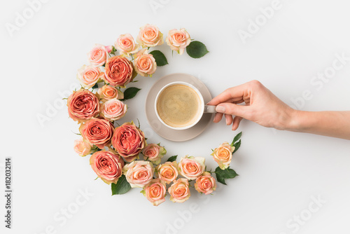 flower wreath with coffee cup