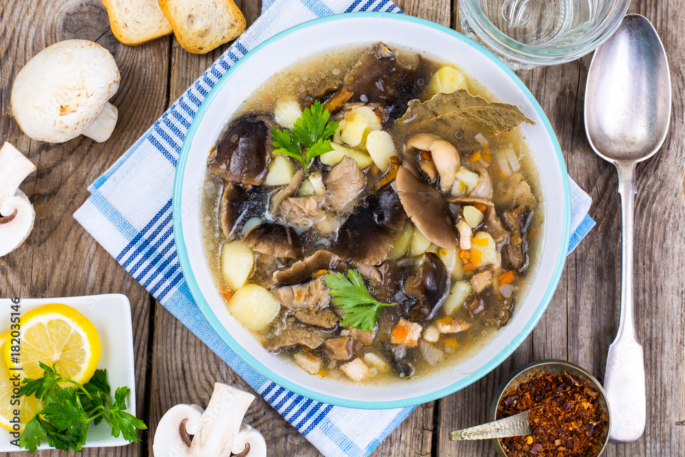 Delicious homemade soup with mushrooms and potatoes Delicious homemade soup with mushrooms and potatoes