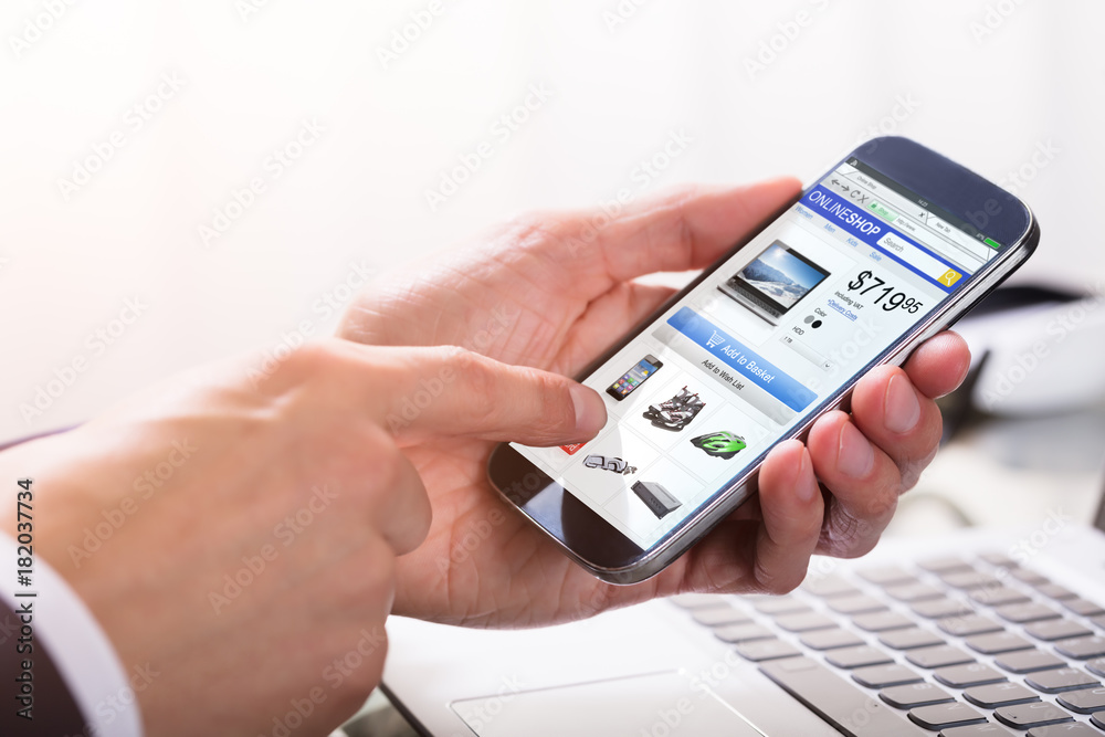 Businessperson Shopping Online On Smartphone Businessperson Shopping Online On Smartphone