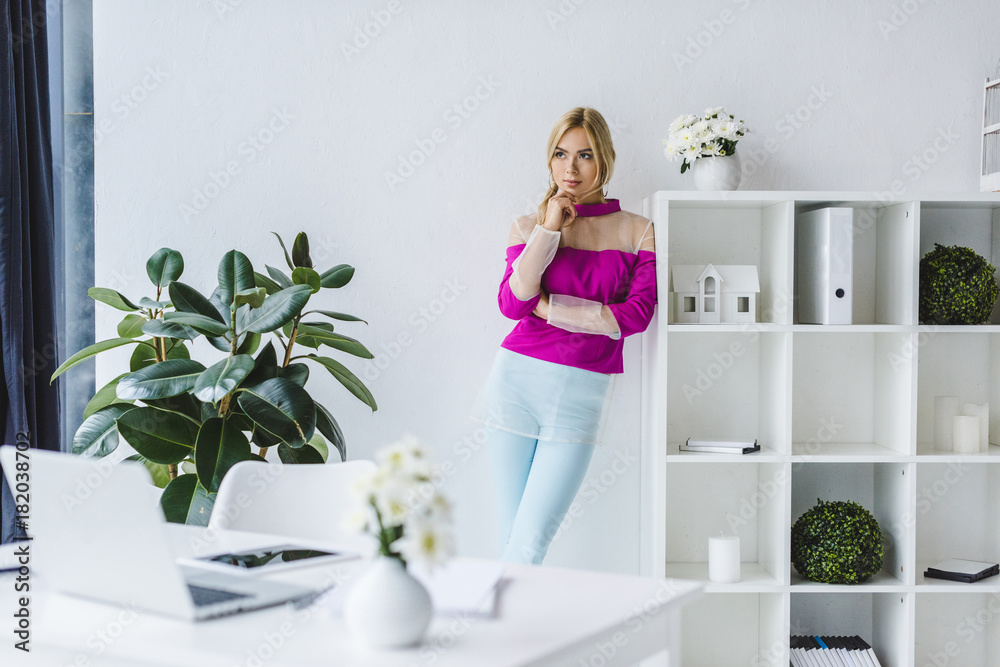 thoughtful stylish businesswoman