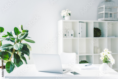 workspace with digital devices © LIGHTFIELD STUDIOS