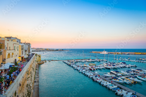 OTRANTO, ITALY - AUGUST 23, 2017 - panoramic view from the old town at sunset during turistic season