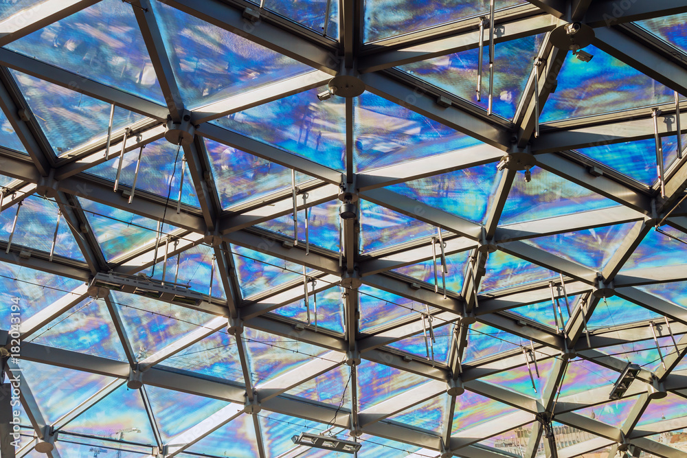 glass roof of building with views of the sky through the glass