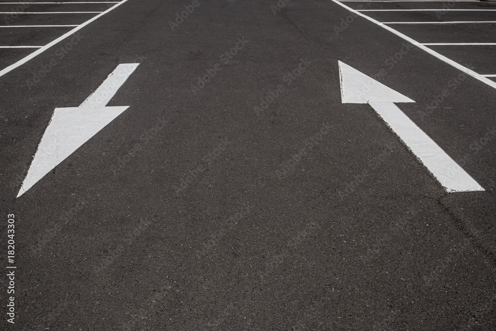 white arrows on black asphalt road background, white arrows on black asphalt road background,