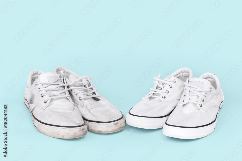 Pair of clean and dirty sneakers on turquoise background Pair of clean and dirty sneakers on turquoise background