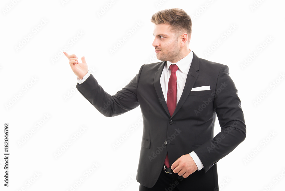 Handsome business man showing copyspace area Handsome business man showing copyspace area