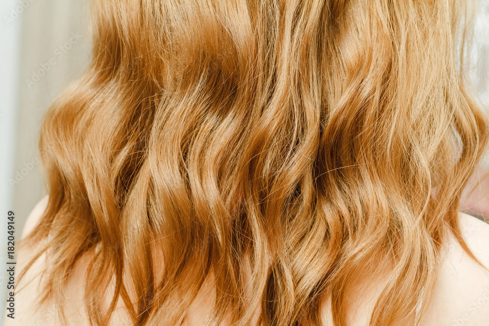 Naklejka premium Background Texture Of Red wavy Ginger Hair