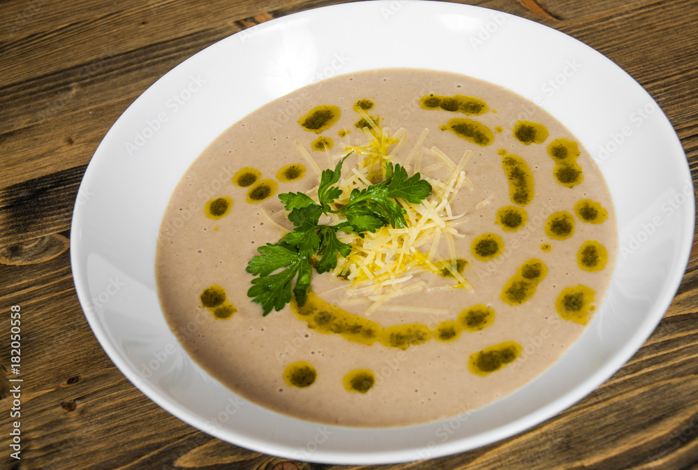 mushroom cream soup on wooden board