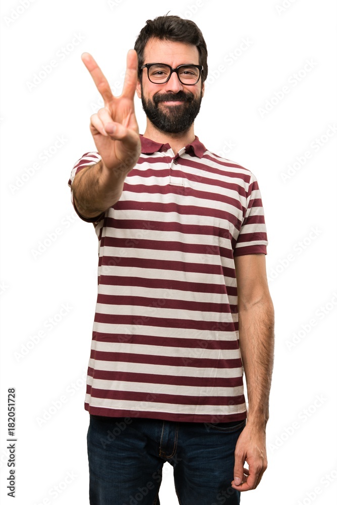 Man with glasses counting two Man with glasses counting two