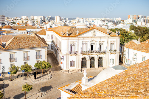 Top cityscape view on the old town with beautiful rooftops in Faro on the south of Portugal