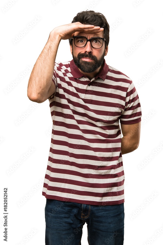 Man with glasses showing something Man with glasses showing something
