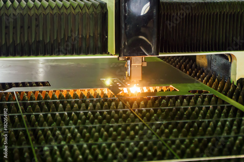 Sheet metal cutting on a laser machine / Photo taken in Russia, at a factory