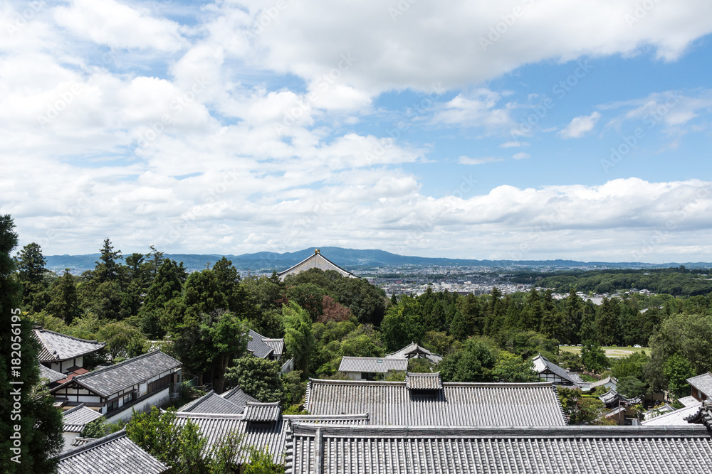 2048400 View of the city of Nara-shi on the top of the mountain on the roofs of houses.