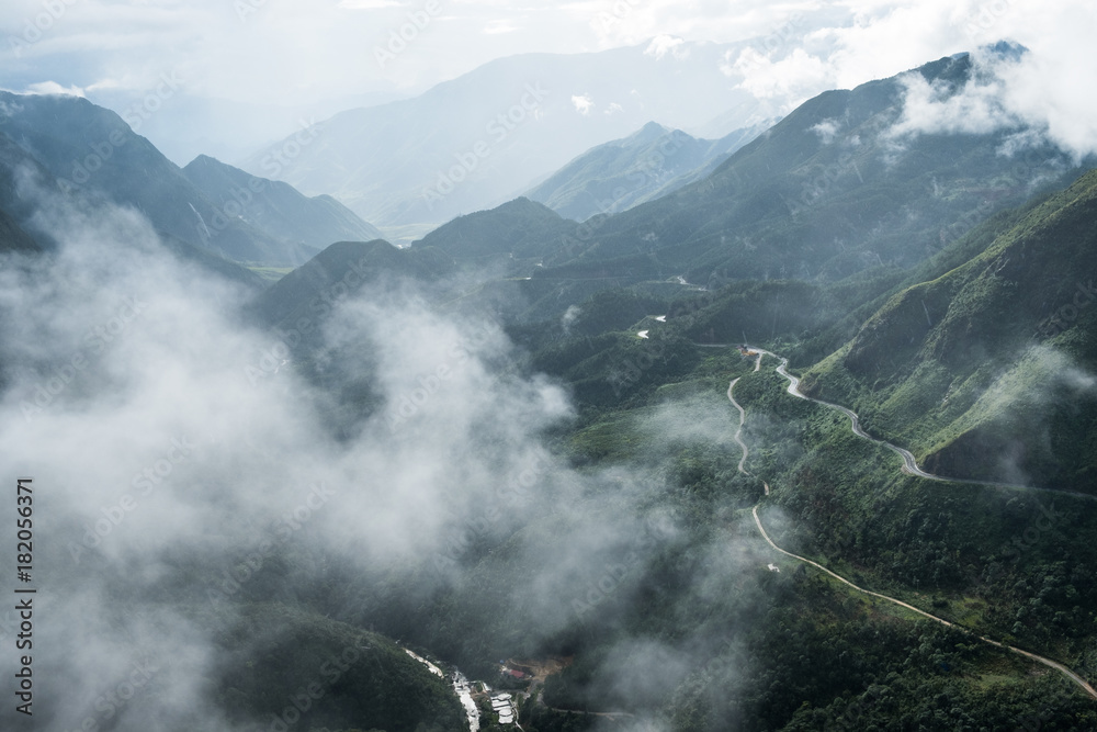 Fototapeta premium Viewpoint mountain range highest on fog in Tram Ton Pass