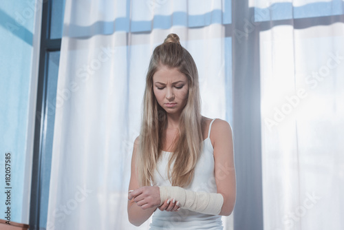 girl with injured hand
