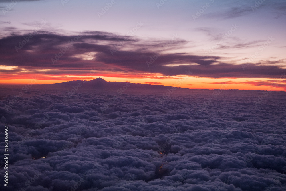 Between the clouds - The lights of Gran Canaria peeks through the clouds