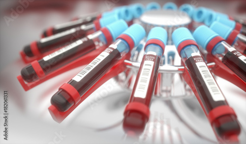 Blood Centrifuge Machine. Lab equipment centrifuging blood. Concept image of a blood test. photo