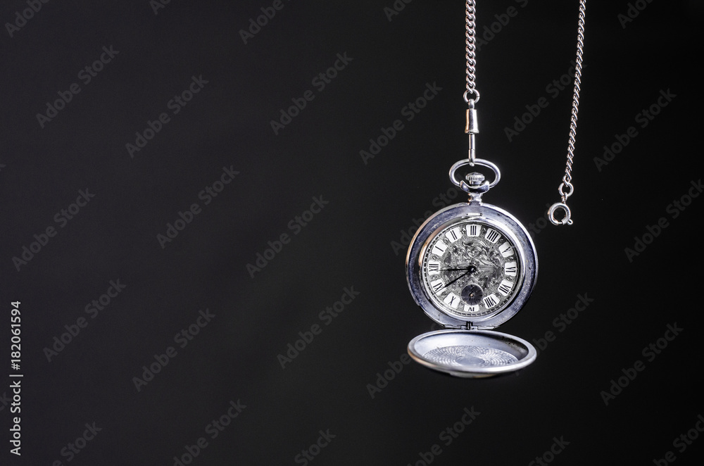 Clock pocket on a dark background Clock pocket on a dark background