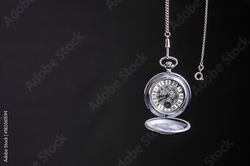 Clock pocket on a dark background