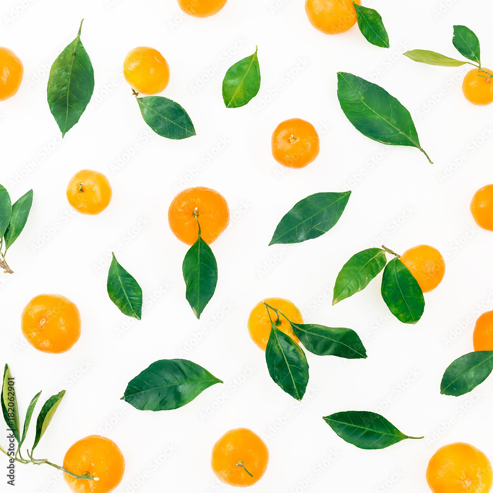Fresh citrus and leaves isolated on white background. Flat lay. Top view Fresh citrus and leaves isolated on white background. Flat lay. Top view