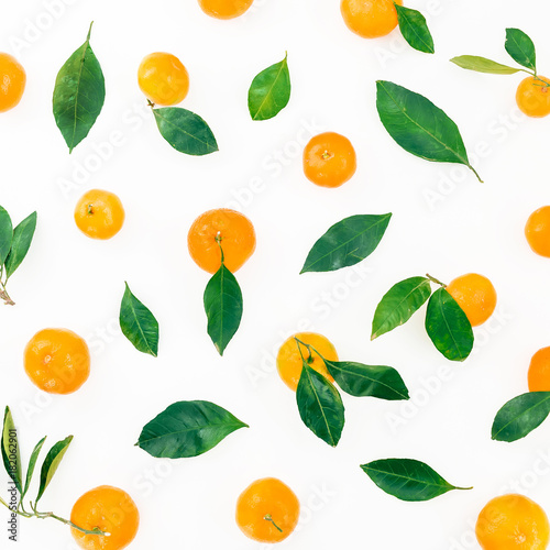 Fresh citrus and leaves isolated on white background. Flat lay. Top view