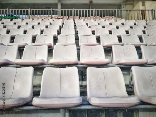 white seats grandstand in stadium for audience and fan club