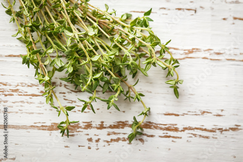 Thyme branches on a light background