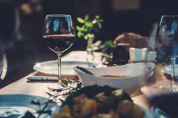 Glass of wine at dining table