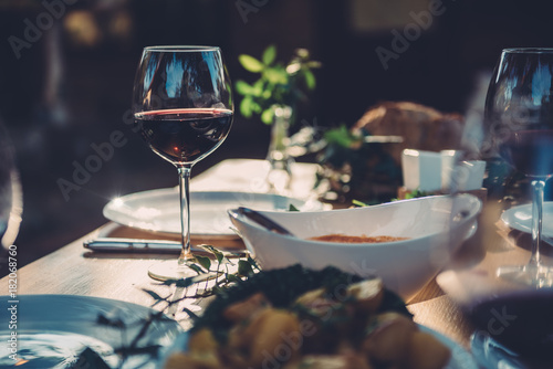Glass of wine at dining table