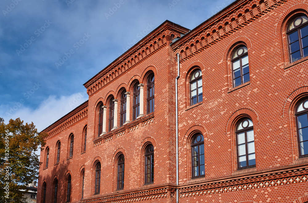 The historic red brick building in the city of Gniezno.
