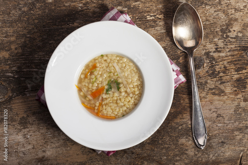 bayerische Riebelesuppe in einem Suppenteller photo